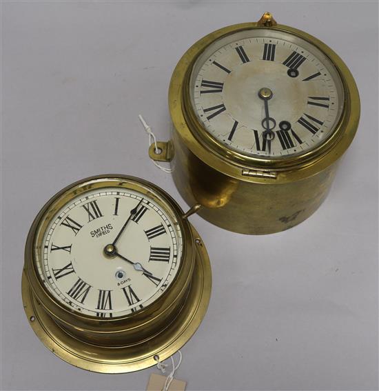 A brass ships bulkhead clock and another by Smith,